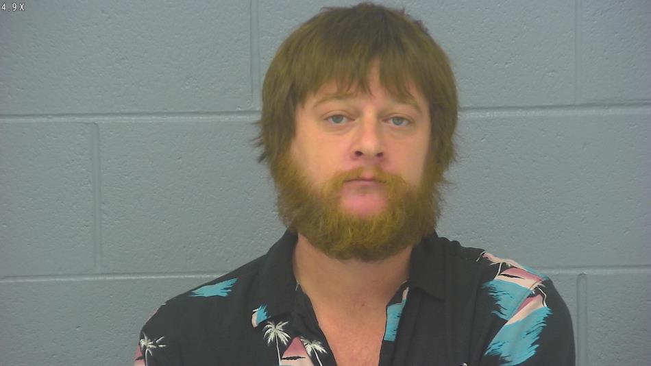 Arrest photo of AARON SUTHERLAND