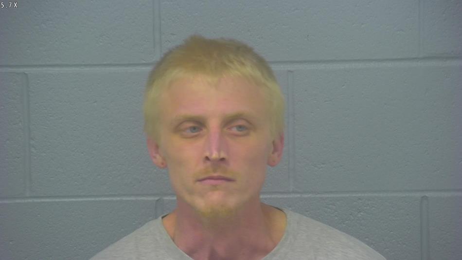 Arrest photo of AUSTIN MOORE