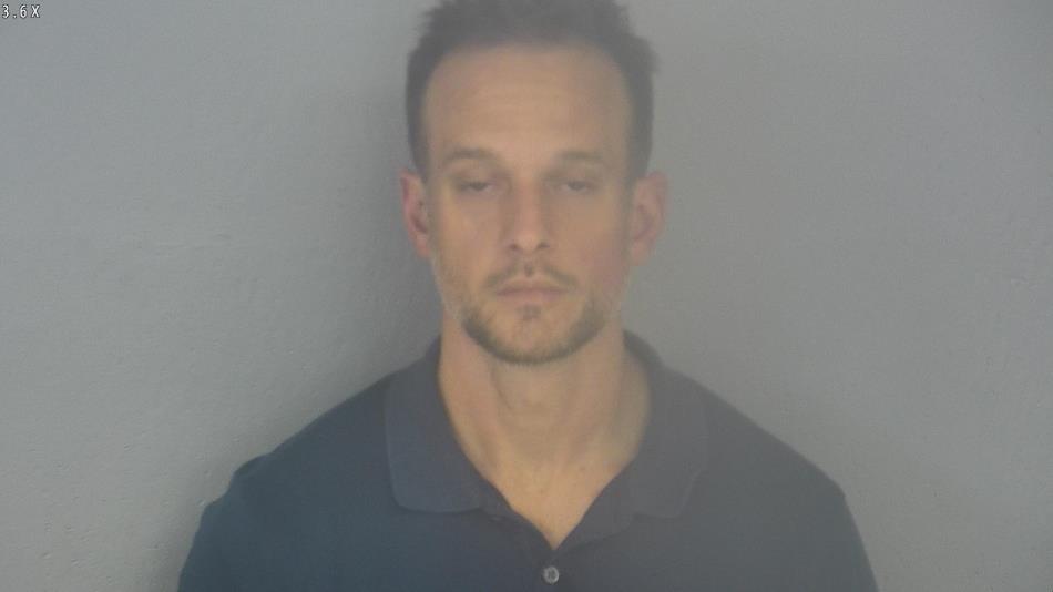 Arrest photo of CHRISTOPHER BAKER