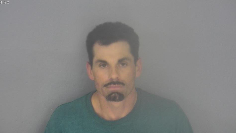 Arrest photo of DANIEL MOORE
