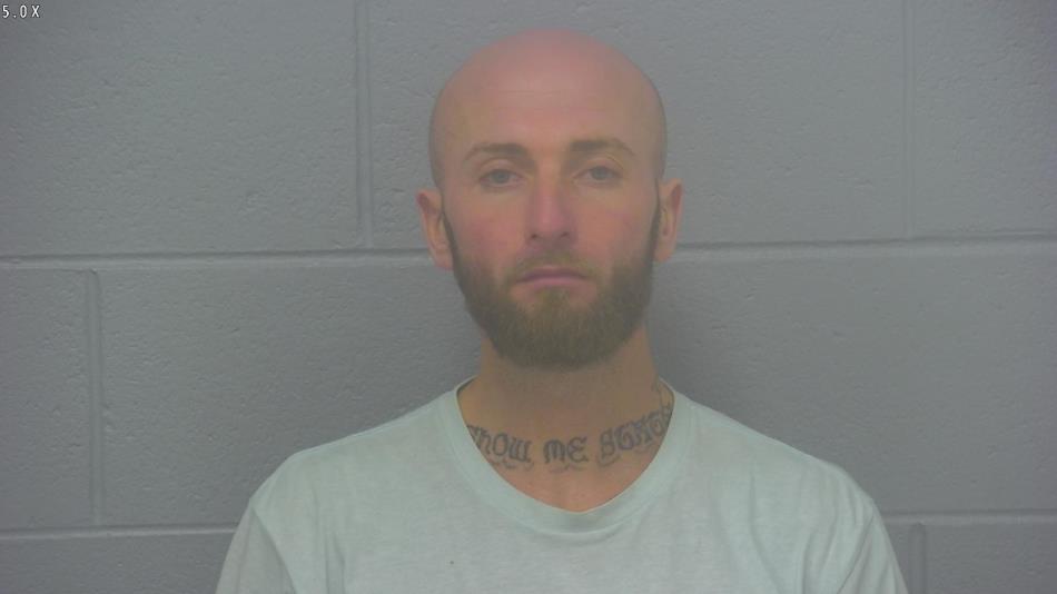 Arrest photo of DUSTIN MOORE