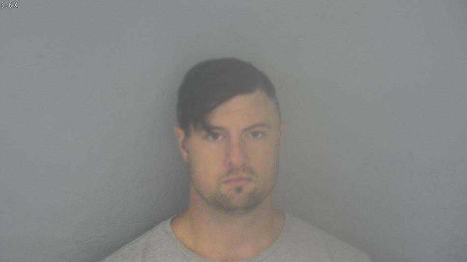 Arrest photo of ERIC KRUGLER