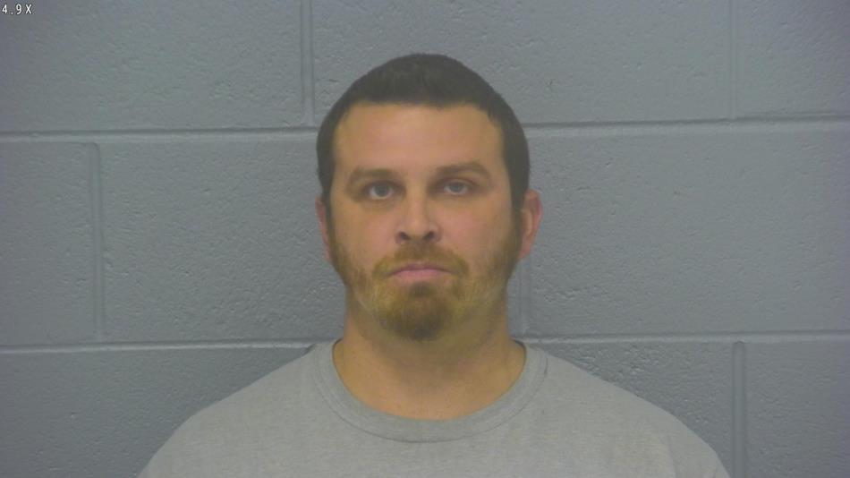 Arrest photo of JONATHON KUHARICH