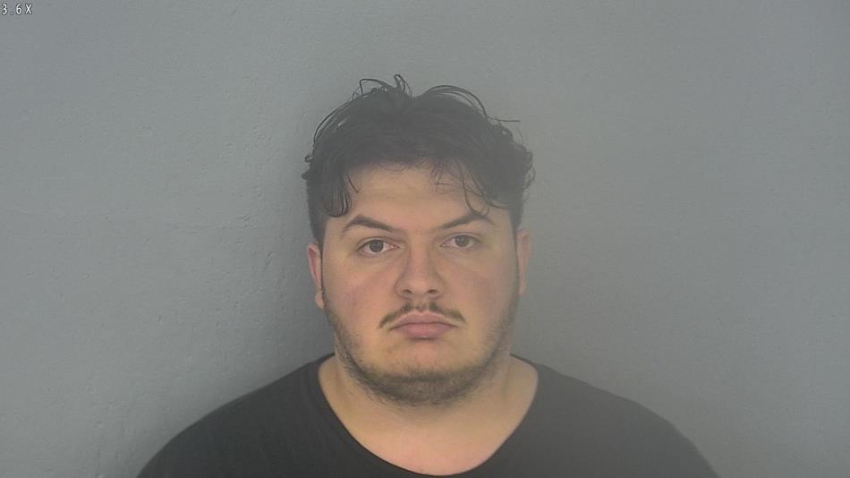 Arrest photo of JUSTIN MARCUM