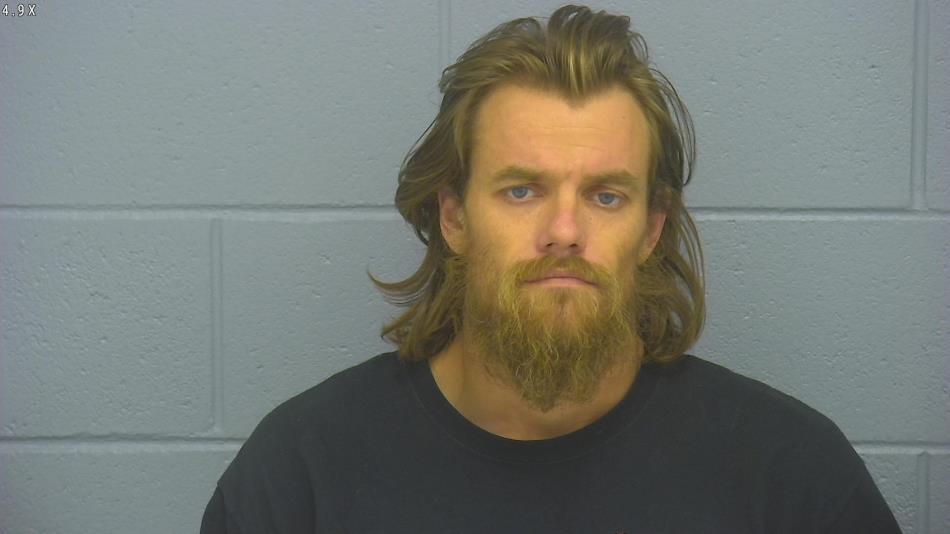 Arrest photo of JUSTIN BARKER