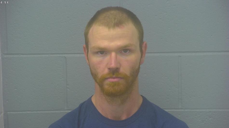 Arrest photo of JUSTIN ARMSTRONG