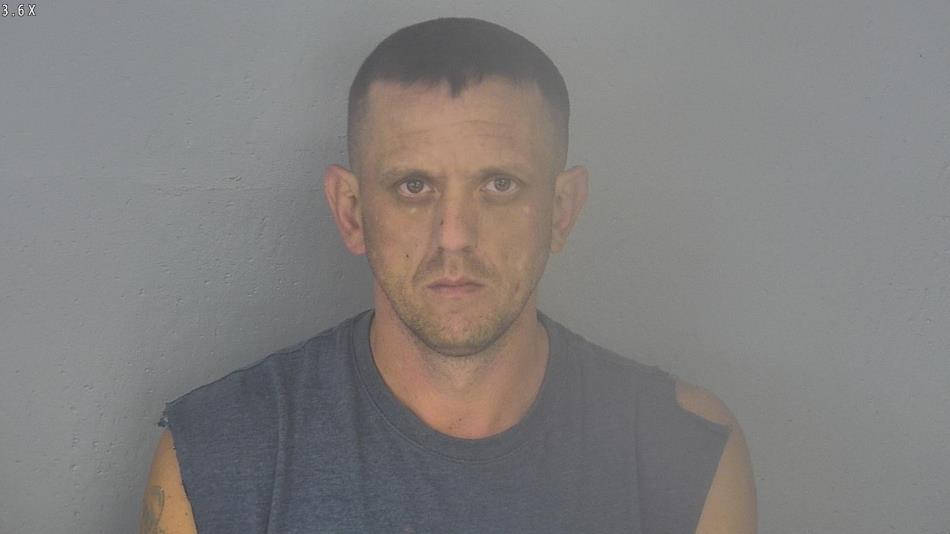 Arrest photo of MATTHEW EVANS