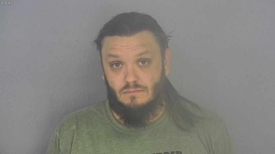 Arrest photo of MATTHEW BAKER
