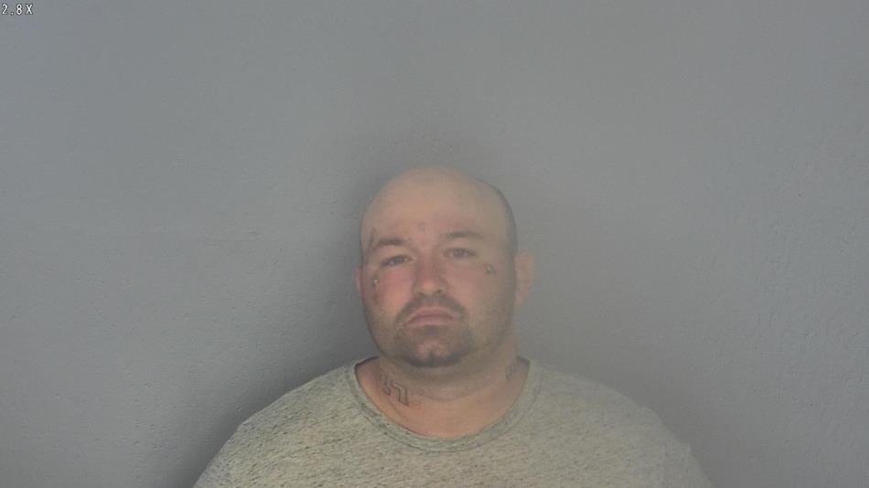 Arrest photo of TIMOTHY HUGGINS