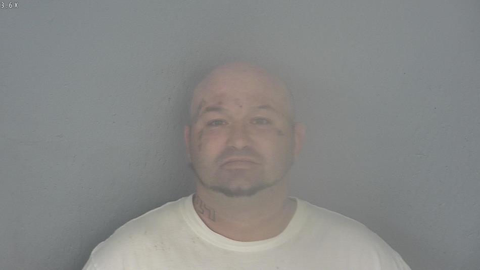 Arrest photo of TIMOTHY HUGGINS