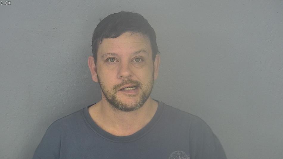 Arrest photo of TRAVIS ROWDEN