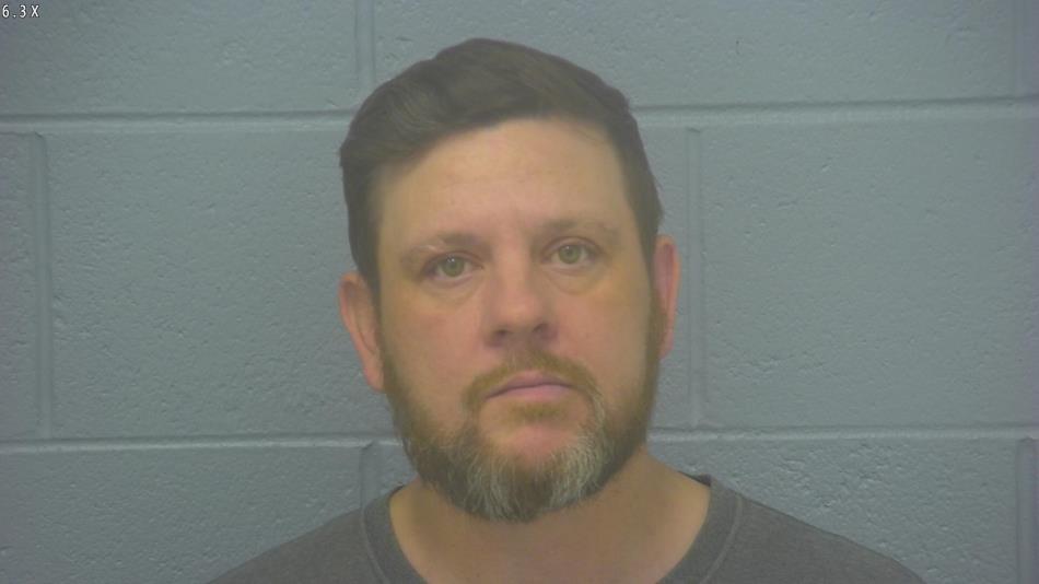 Arrest photo of TRAVIS ROWDEN