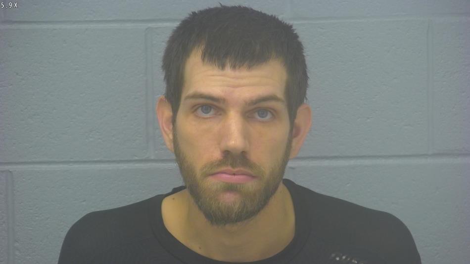 Arrest photo of TYLER BUSSARD